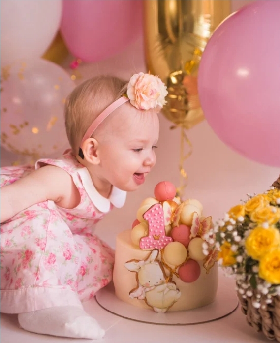 girl celebrating her first year of milestones